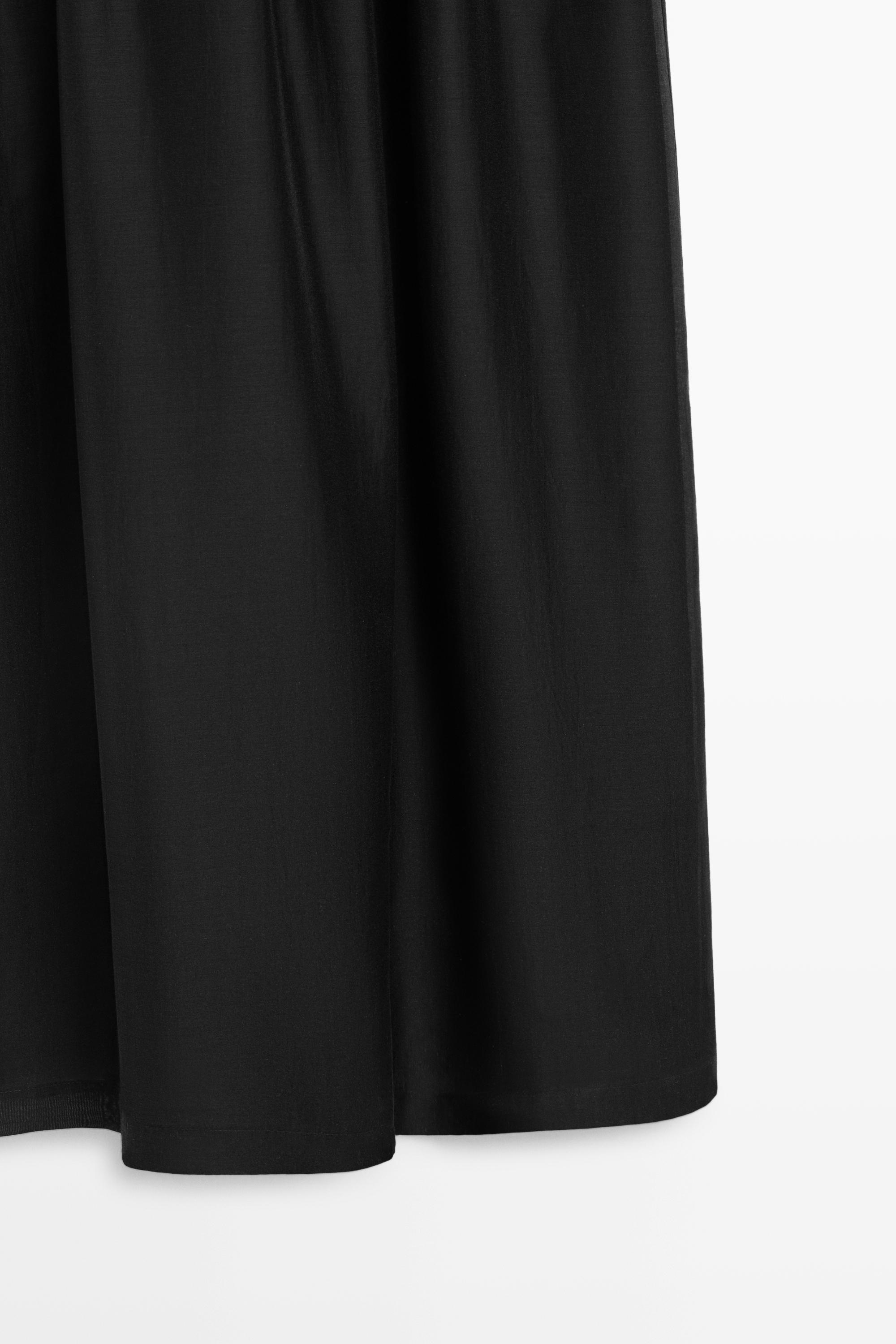 Robe midi combinée à bretelles
